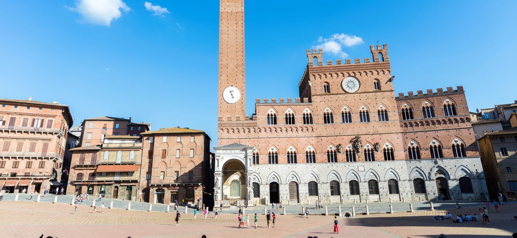Piazza del Campo, Siena, Italy - stock photo
Pictured is the Torre del Mangia and town hall building which also houses the Museo Civico